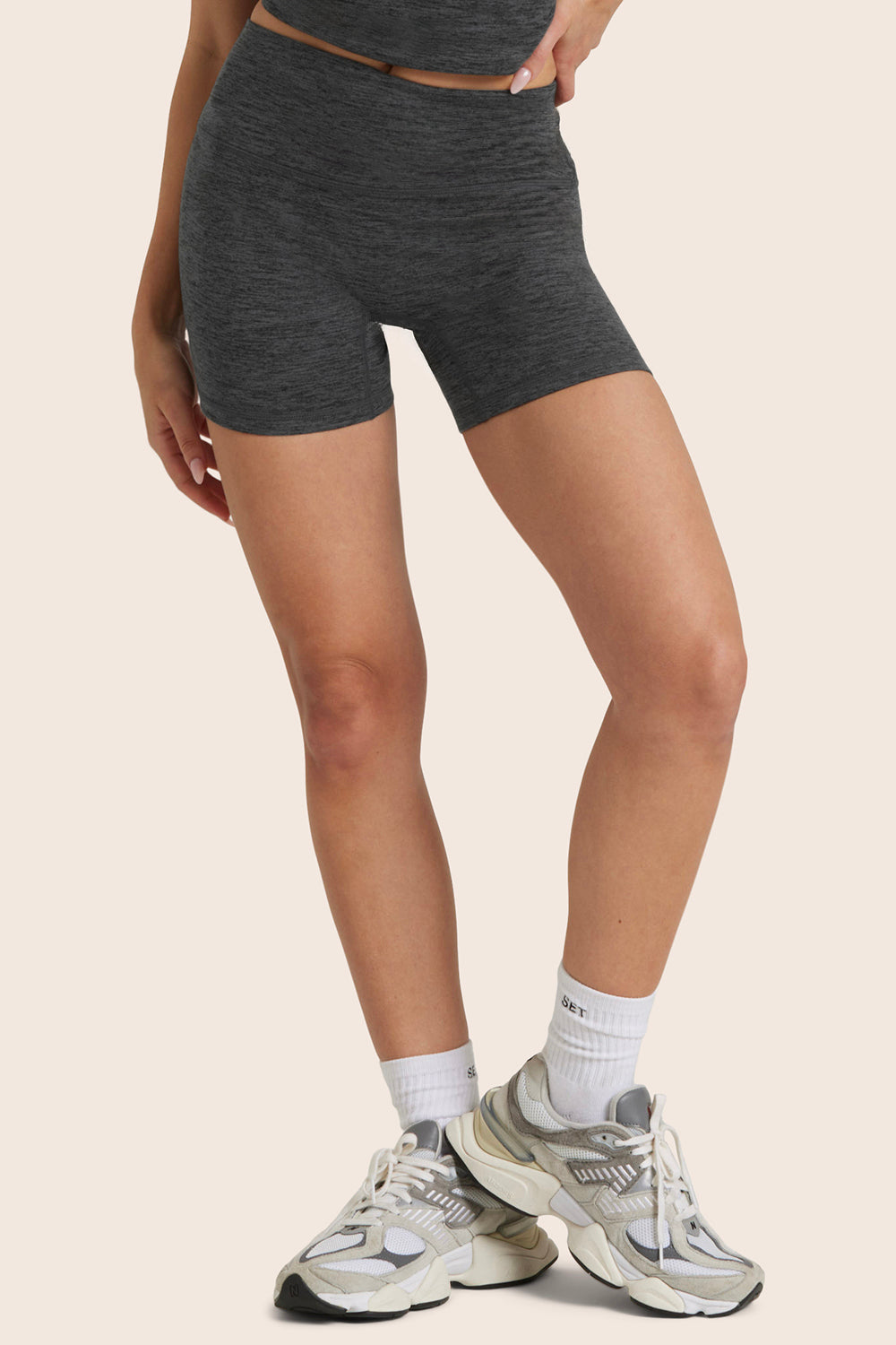 MODEL WEARS FORMCLOUD® CLOUD SHORTS IN PEPPER HEATHER GREY