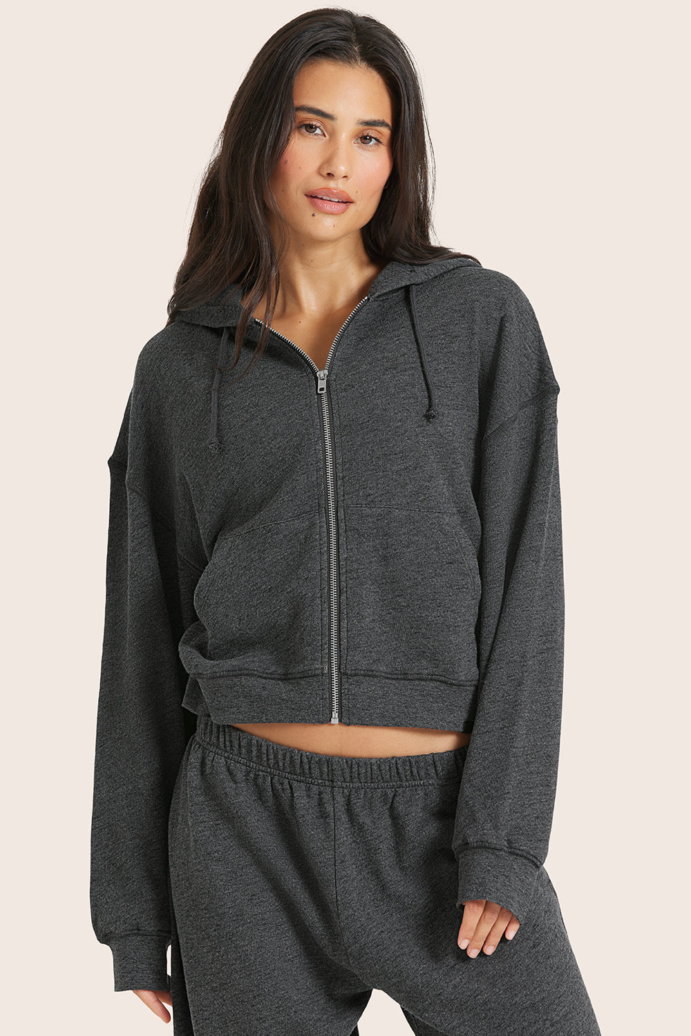 MODEL WEARS LIGHTWEIGHT SWEATS CLASSIC ZIP HOODIE IN PEPPER HEATHER GREY