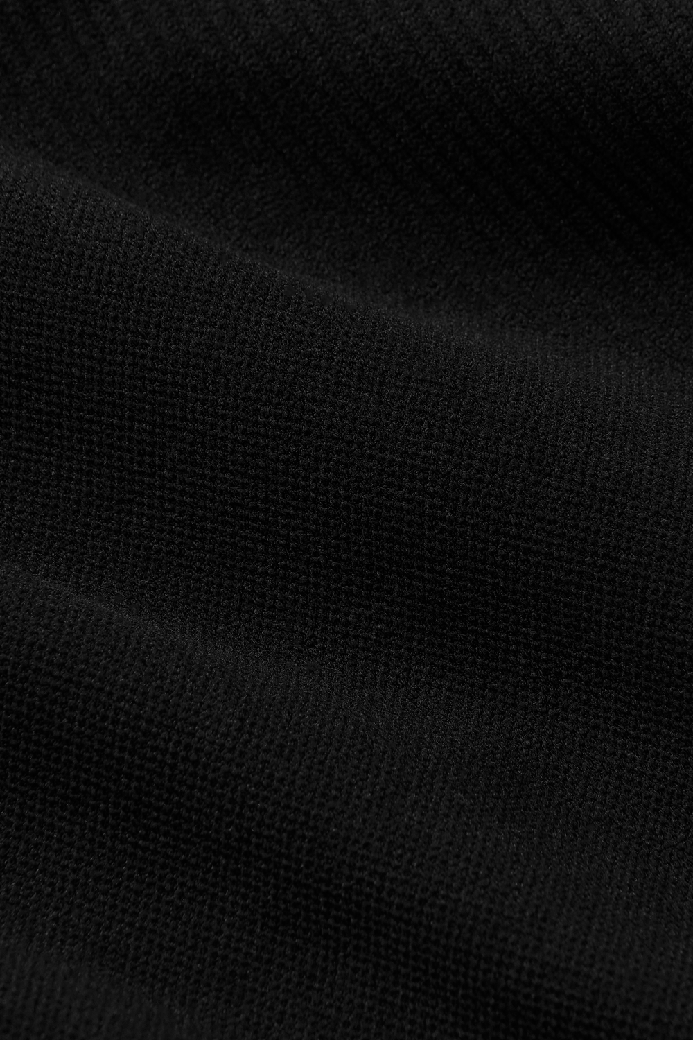 CLOSE UP IMAGE OF SCULPTFLEX® FABRIC IN ONYX