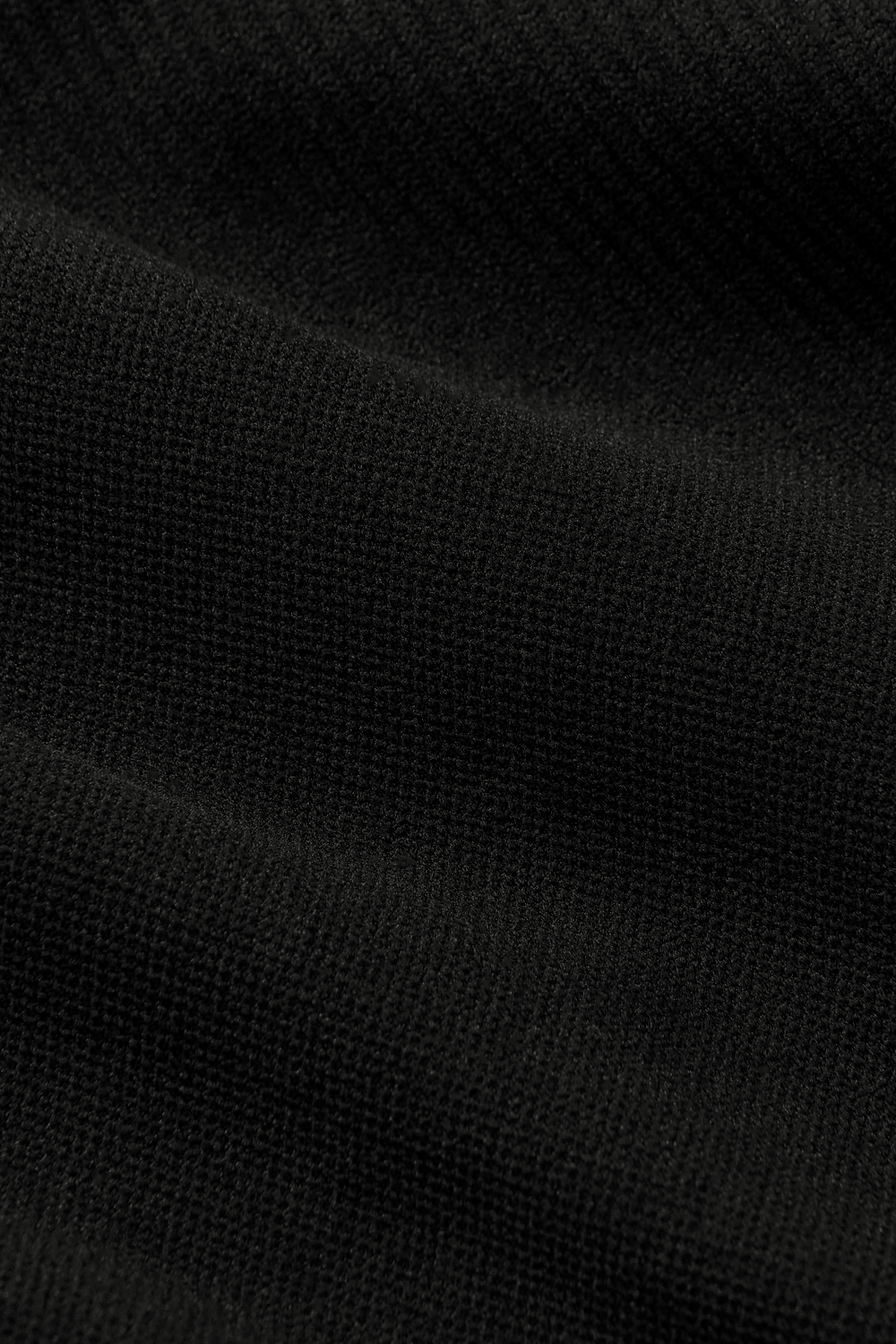 CLOSE UP IMAGE OF SCULPTFLEX® FABRIC IN ONYX