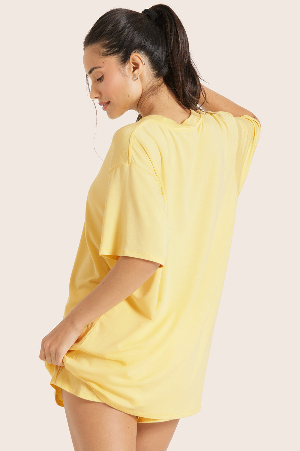 MODEL WEARS SLEEP JERSEY OVERSIZED BOYFRIEND SLEEP TEE IN DANDELION