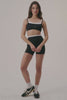 MODEL WEARS SET™ FORMCLOUD® CLOUD CONTROL SHORTS IN ORCA