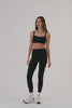 MODEL WEARS SET™ SPORTBODY® SPORTY LEGGINGS IN ONYX