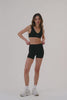 MODEL WEARS SPORTBODY® SPORTY SHORTS IN ONYX