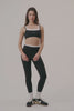 MODEL WEARS SET™ FORMCLOUD® CONTROL LEGGINGS IN ORCA