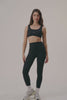 MODEL WEARS AIRLUXE™ BREATHE HIGH-RISE LEGGINGS IN ONYX